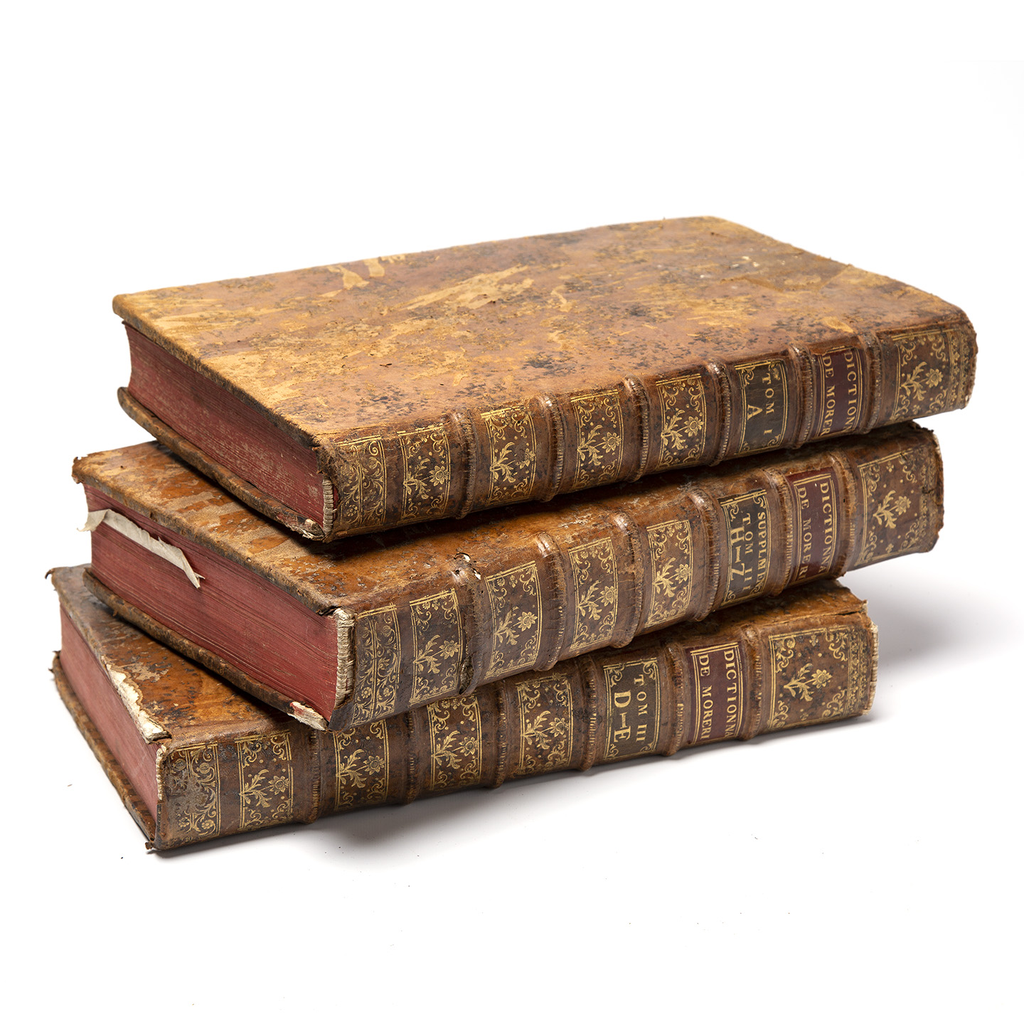 3 Old Books Stacked on Each Other Graphic by Mint Pixels