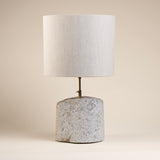 Lamp from Carved Rustic Stone Block with Minimalist Brass Neck