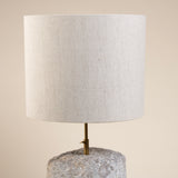 Lamp from Carved Rustic Stone Block with Minimalist Brass Neck