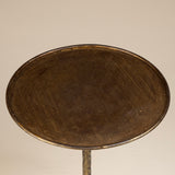 Bronze drinks table with a hammered textured finish