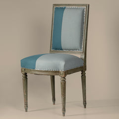 Set of Six French Polychromed Beech Louis XVI Style Dining Chairs, 20th c. rectangular canted backs over trapezoidal bowed seats, on turned tapered reeded legs, in blue velvet upholstery with iron tack decoration,