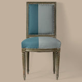 Set of Six French Polychromed Beech Louis XVI Style Dining Chairs, 20th c. rectangular canted backs over trapezoidal bowed seats, on turned tapered reeded legs, in blue velvet upholstery with iron tack decoration,