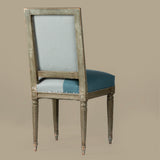 Set of Six French Polychromed Beech Louis XVI Style Dining Chairs, 20th c. rectangular canted backs over trapezoidal bowed seats, on turned tapered reeded legs, in blue velvet upholstery with iron tack decoration,