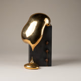 Handmade Ceramic Sculpture in Burnished Gold on Steel Pedestal with Metal Rivets, Titled: The Drip