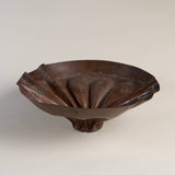 Vintage brutalist copper bowl with fluted design and aged patina.